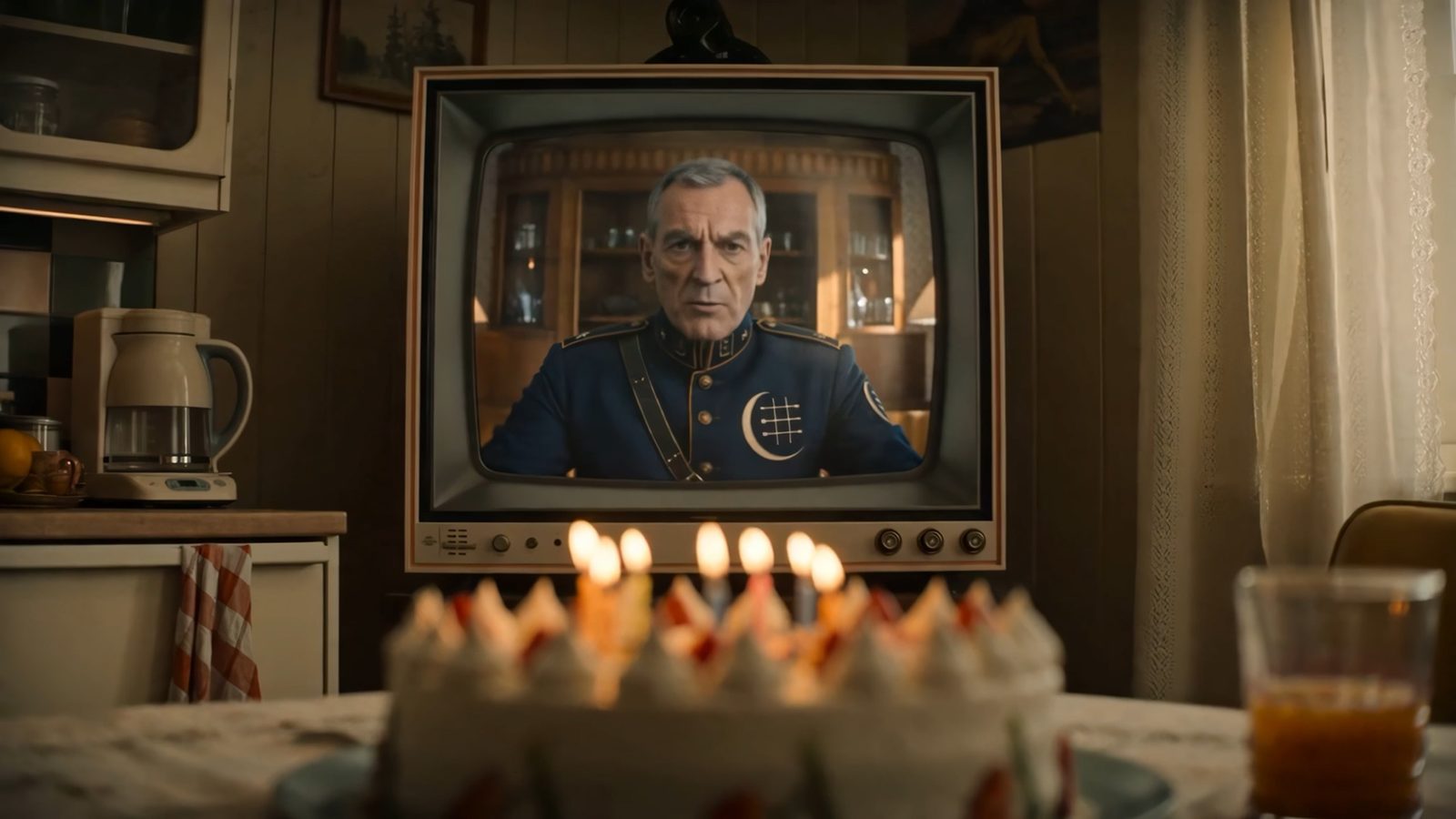 Birthday candles — and the colonel's greeting